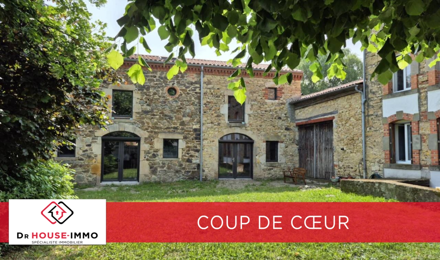 Photo 1 : Vente Maison 8 pièces Issoire 344 m²