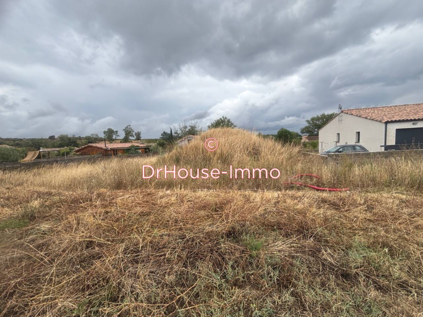 Photo 1 : Vente Terrain Brugairolles 521 m²