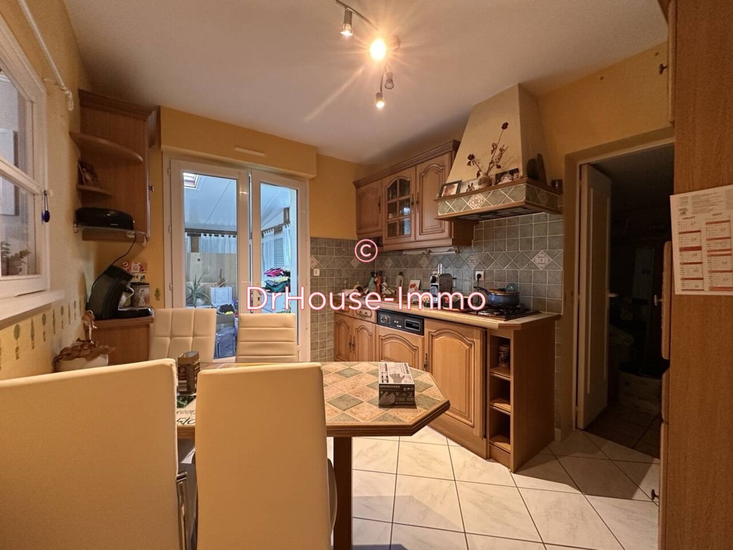 Photo 2 : Vente Maison 5 pièces Fleury-sur-Orne 113 m²