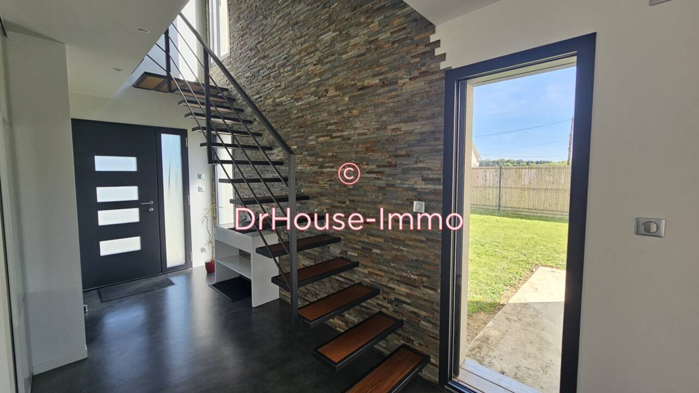 Photo 2 : Vente Maison 6 pièces Changé 155 m²