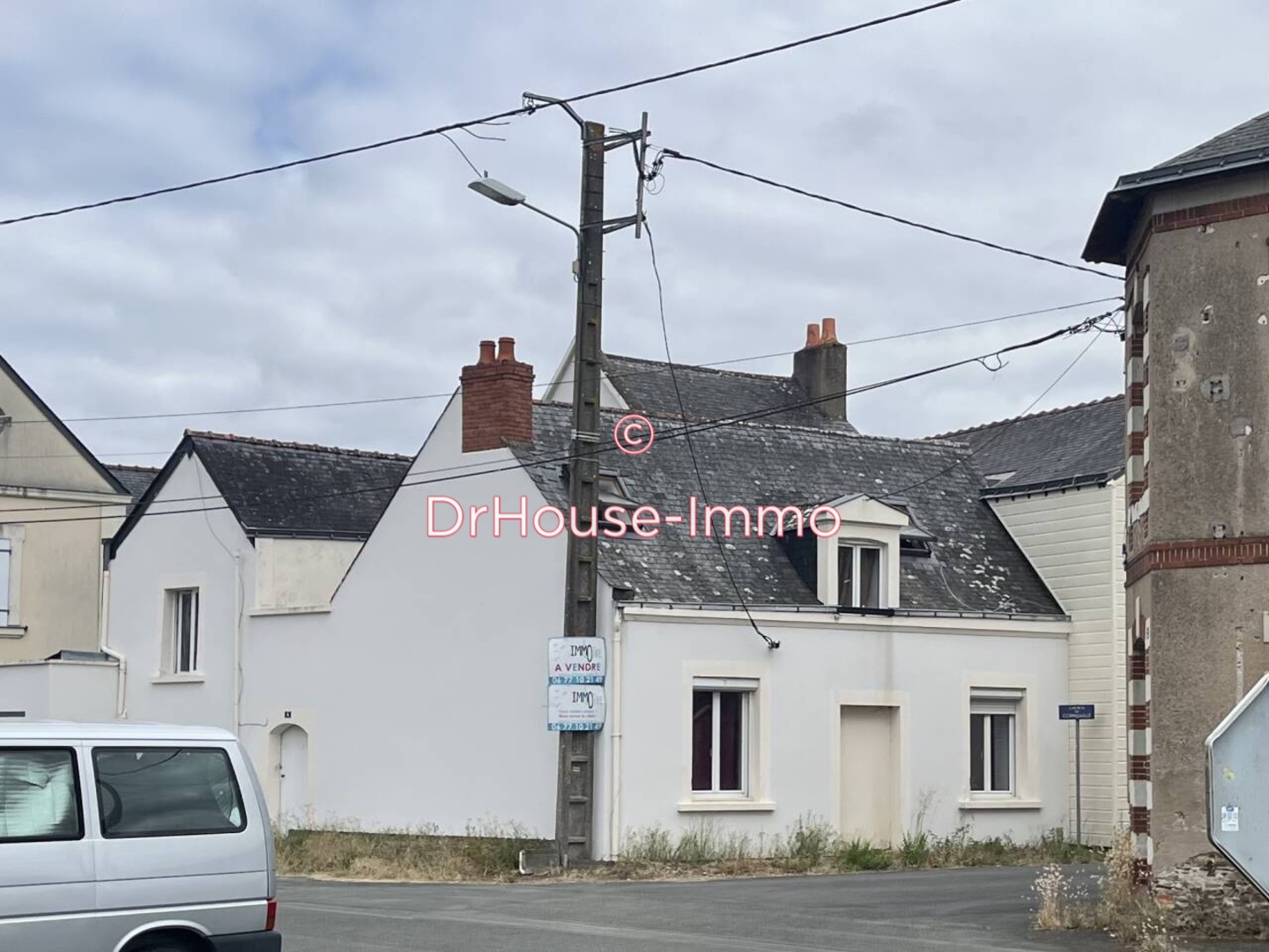 Photo 1 : Vente Immeuble 10 pièces Sainte-Gemmes-sur-Loire 140 m²