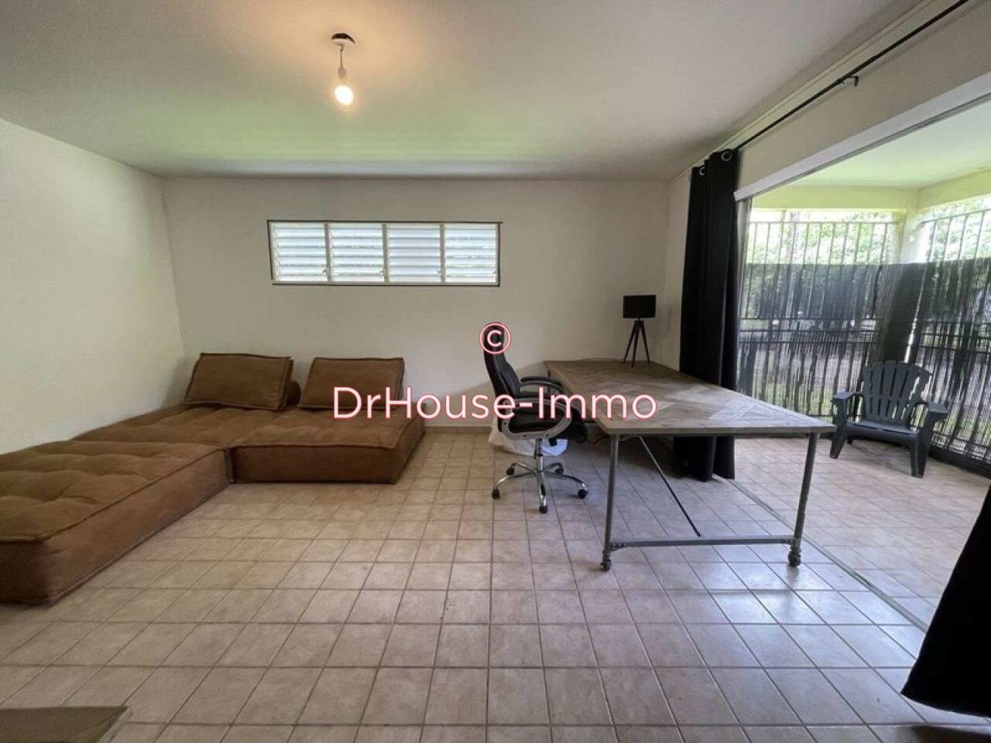 Photo 1 : Vente Appartement 3 pièces Sainte-Rose 58 m²
