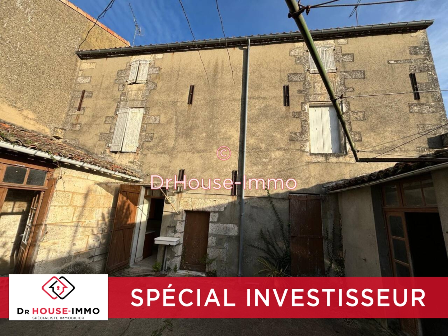 Photo 1 : Vente Immeuble 11 pièces Gond-Pontouvre 230 m²