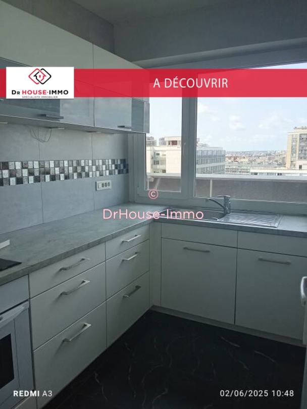 Photo 1 : Vente Appartement 3 pièces Paris 64 m²