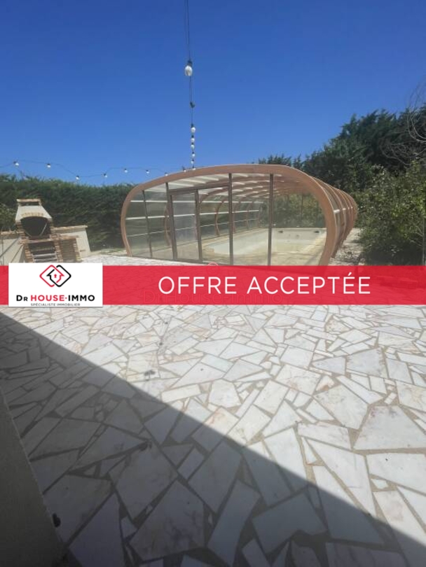 Photo 1 : Vente Maison 7 pièces Saint-Doulchard 205 m²