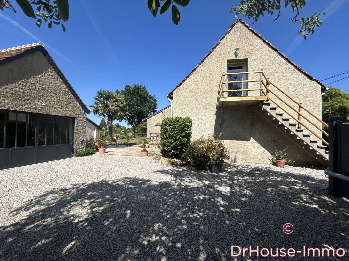 Photo 3 : Vente Maison 8 pièces Saint-Ouen-en-Belin 151 m²