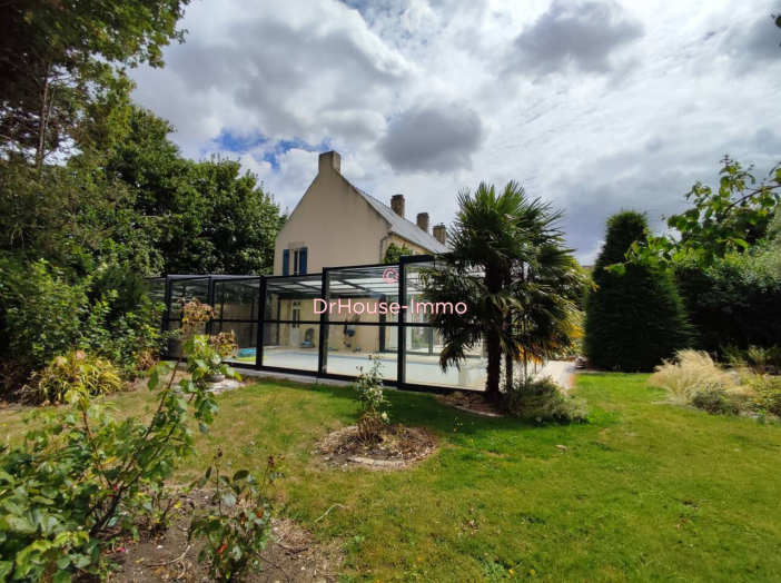Maison de 255m² - 9 pièces