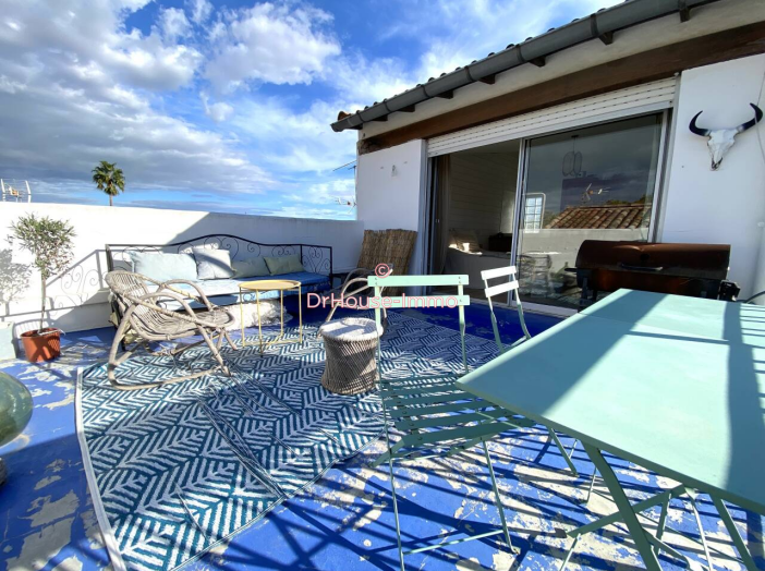 Appartement 6 pièces de 137 m² - Aigues-Mortes (30220)