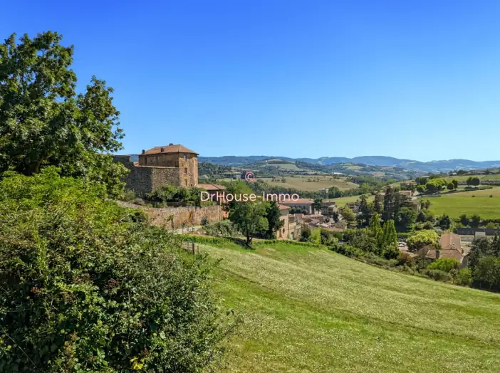 Maison 8 pièces de 75 m² - Sain-Bel (69210)