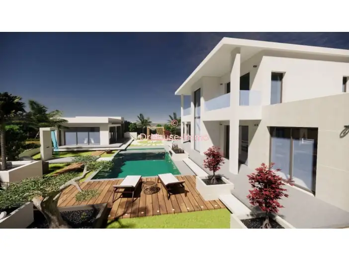 Maison 7 pièces de 242 m² - Saint-Laurent-sur-Saône (01750)