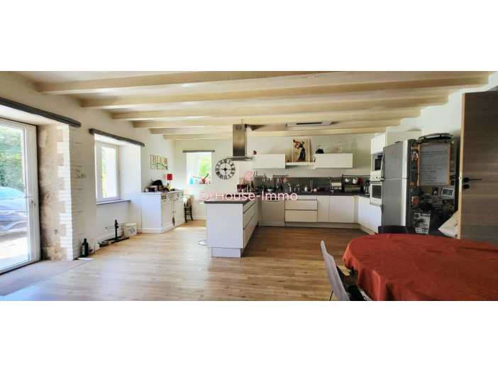 Maison de 218m² - 7 pièces