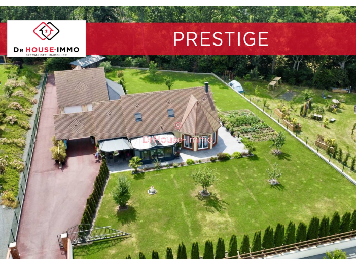 Maison de 241m² - 9 pièces