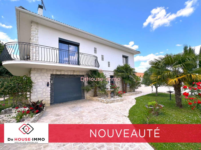 Maison de 221m² - 9 pièces