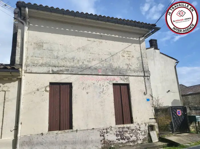 Maison 4 pièces de 99 m² - Bourg (33710)