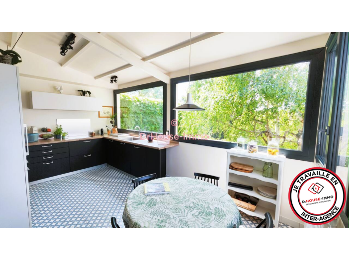 Maison de 219m² - 9 pièces