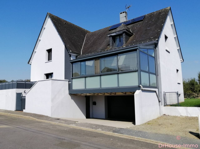 Maison de 219m² - 7 pièces