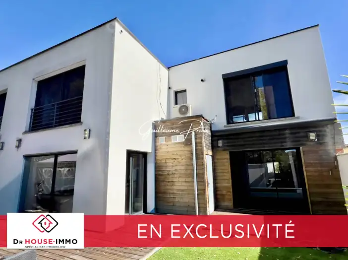 Maison 5 pièces de 141 m² - Carbon-Blanc (33560)